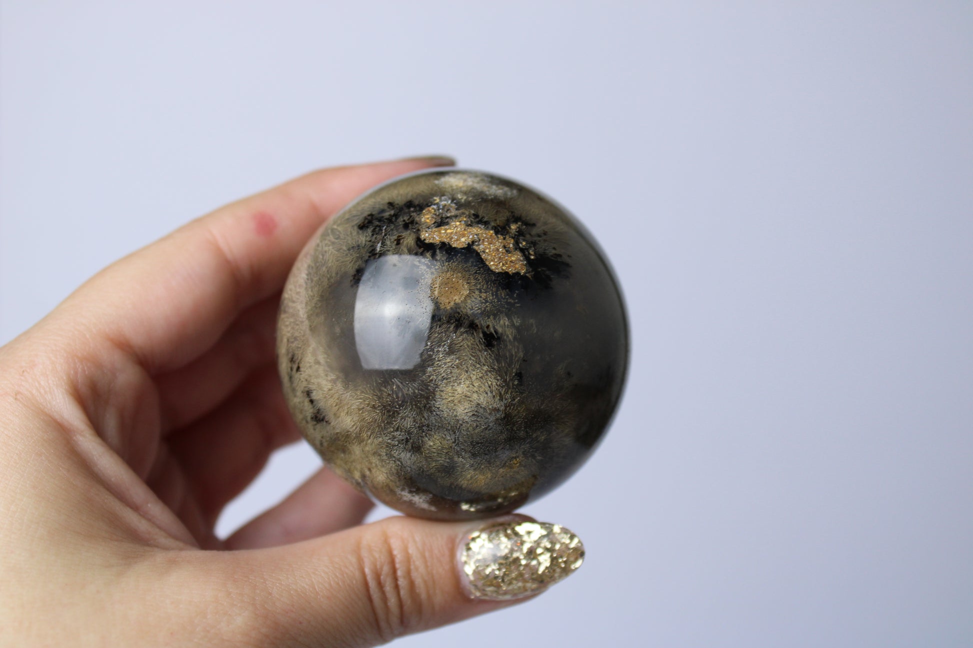 Rutiel agaat bol - Gemstone Dreams