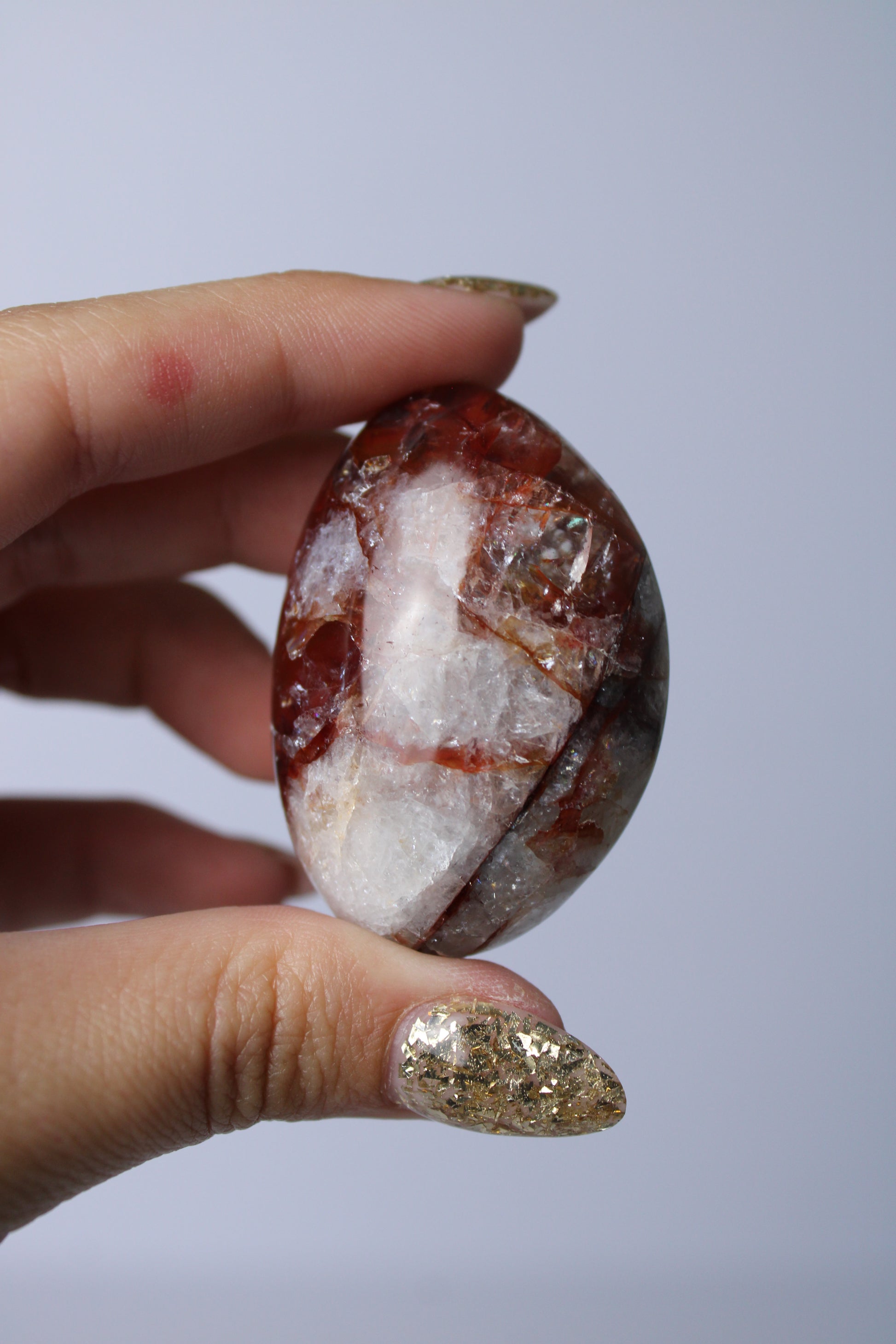 Fire quartz palmsteen - Gemstone Dreams