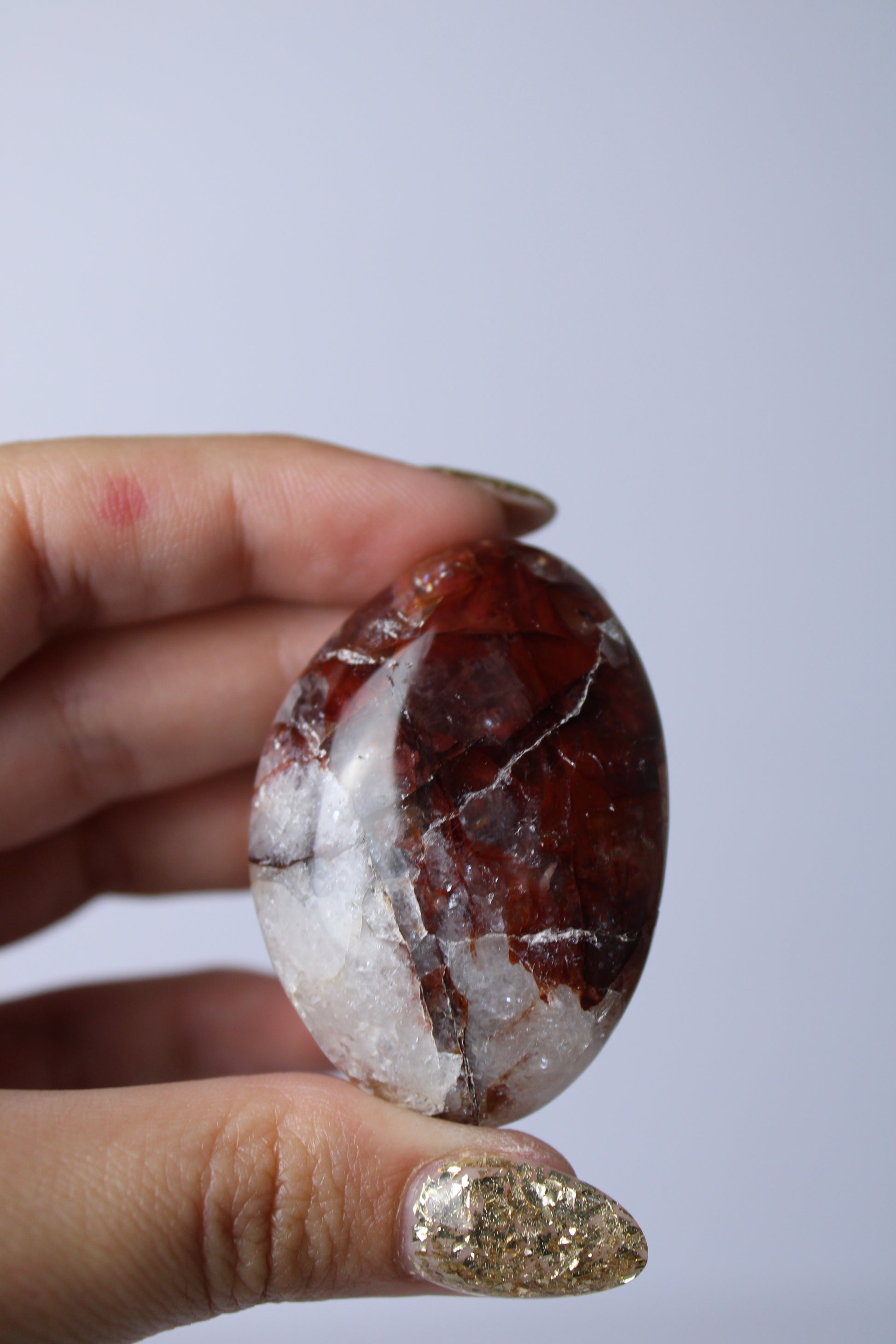 Fire quartz palmsteen - Gemstone Dreams