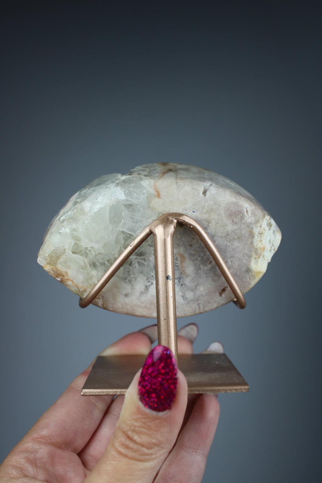 Pink amethyst eye on stand