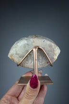 Pink amethyst eye on stand