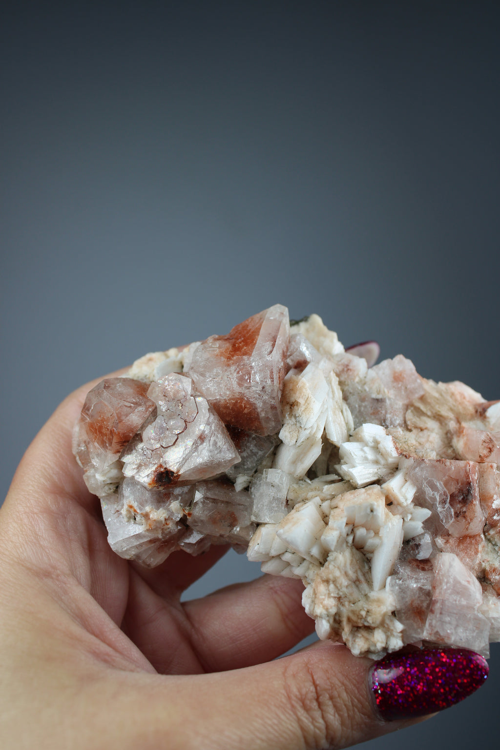 Hematiode quartz cluster with calcite